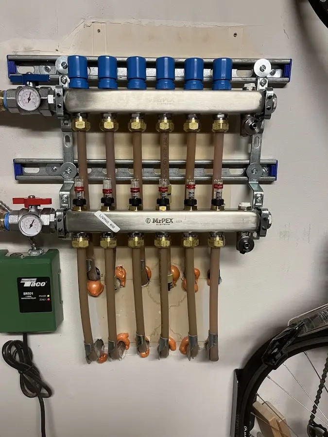 Plumber performing Water Heater Repair at a residential property in Bethesda